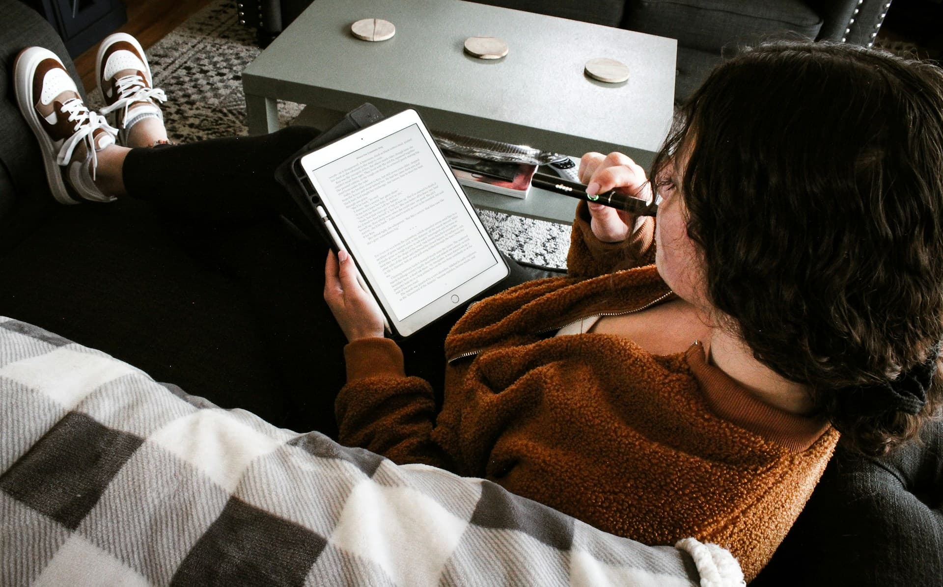 Writer developing an e-book manuscript on a laptop
